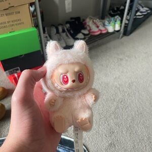 Adorable Plush Toy with Pink Accents